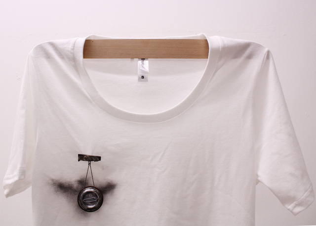 Coal dust smudge on organic cotton t-shirt